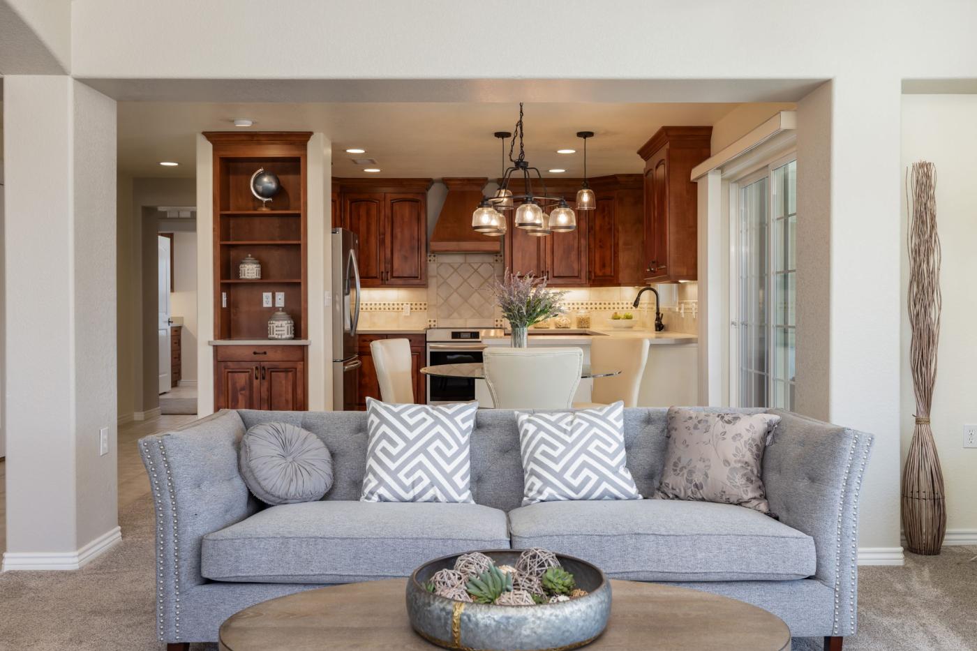 Living room, dining room, & kitchen in a Cottage